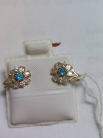 14k Yellow Gold with blue stone and Cz Huggie
