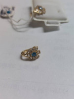 14k Yellow Gold with blue stone and Cz Huggie