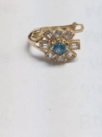 14k Yellow Gold with blue stone and Cz Huggie