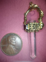 Crystal pendant with ruby.