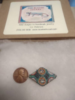 Handmade brooch or lapel pin