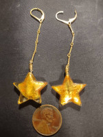 Gold star dangle earrings 14/20 gf