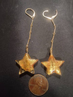 Gold star dangle earrings 14/20 gf