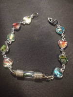 Silver bracelet with hearts