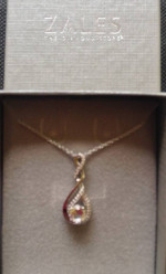 NEW WHITE SAPPHIRE TWIST INFINITY PENDANT