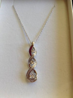NEW WHITE SAPPHIRE TWIST INFINITY PENDANT