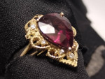 7 1/2 ct. rhodolite garnet 14K ring with eight diamonds