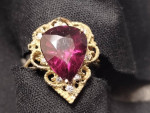 7 1/2 ct. rhodolite garnet 14K ring with eight diamonds