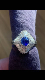 Ladies Sapphire and diamond ring. Ballerina style setting.