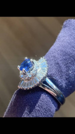 Ladies Sapphire and diamond ring. Ballerina style setting.
