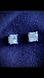 Ladies Princess cut diamond earrings .50 carat each.