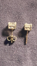 Ladies Princess cut diamond earrings .50 carat each.