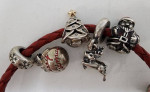 Pandora Christmas Themed 10 Charms on a Red Leather Bracelet