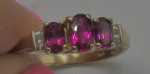 10KT YELLOW GOLD RING SIZE 7.25 2.2 GRAMS 3 RED STONES 4 DIAMONDS MINT