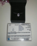 Leo Round cut diamond pear shaped necklace. 14kWG. 1/2ct.