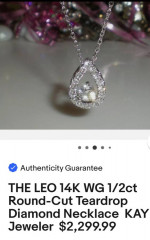 Leo Round cut diamond pear shaped necklace. 14kWG. 1/2ct.