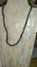 Silver tone twisted bead necklace