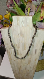 Silver tone twisted bead necklace