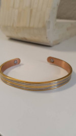 Silver and gold tone copper lined cuff
