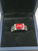 MEN'S SILVER PLATED RING WITH CROSS DESIGN ON SIDES WITH RED STONE
