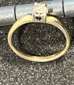 Woman’s gold/white gold engagement ring