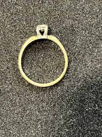 Woman’s gold/white gold engagement ring