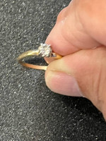 Woman’s gold/white gold engagement ring