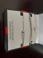 Sterling silver bracelet with 1/10 CTTW Diamond - new in a box