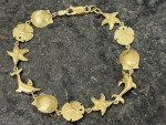 Beautiful, Unique 14K Gold Sea Shells, Star Fish and Dolphins Bracelet
