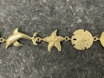 Beautiful, Unique 14K Gold Sea Shells, Star Fish and Dolphins Bracelet