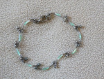 SILVER COLORED BRACELET w GREEN INSETS