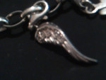 THOMAS SABO STERLING WITH  (3)  CHARM BRACELET
