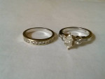 Rings: 1 Engagement ring, & 1 Wedding band