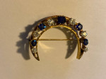 beautiful antique ladies pin with diamonds and sapphires