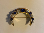 beautiful antique ladies pin with diamonds and sapphires