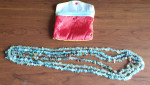 necklace: three rows of rock beads