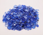 10,000+ carats of cut, faceted aquamarine, blue topaz, & amythest gems