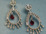 Unique ruby teardrop earrings w/ diamond in white gold