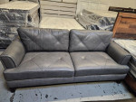 Dark gray leather sofa