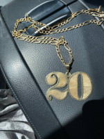 Win a 50 gram 14k gold chain and charm