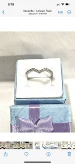 Brand new 17 authentic diamonds set in a solid silver prom ring. Size 7.