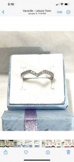 Brand new 17 authentic diamonds set in a solid silver prom ring. Size 7.