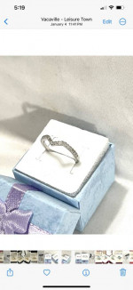 Brand new 17 authentic diamonds set in a solid silver prom ring. Size 7.