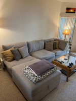 Gray Crate & Barrel sectional sofa with storage ottoman