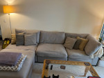 Gray Crate & Barrel sectional sofa with storage ottoman