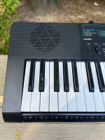 Casio CTK-2300 61-key electronic keyboard with AC adapter