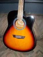 Guitar Acoustic or  electric  by Washburn is new A+