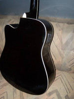 Guitar Acoustic or  electric  by Washburn is new A+