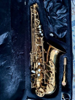 Barely used Glory Gold Laquer E Flat Alto Saxophone