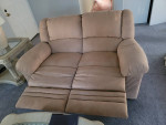 Sofa and love seat all 4 sides recliner almost New!